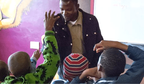 local community partner with school children in Africa