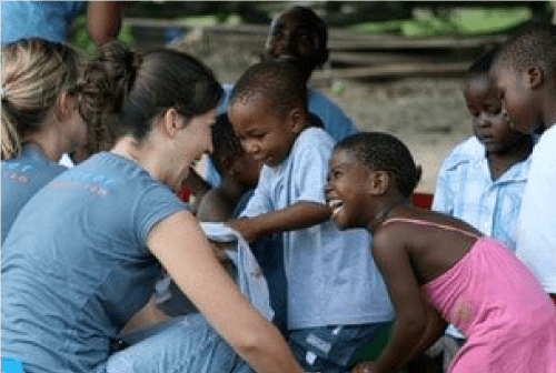 African Impact volunteer enjoying meaningful interactions with African kids