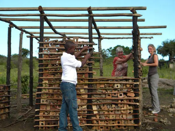 Volunteers in St Lucia teaching sustainable ecobricking practices.
