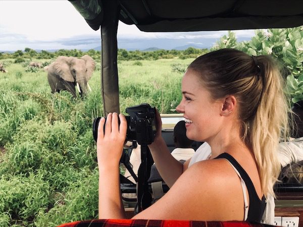 wildlife photography volunteer taking pictures of elephants