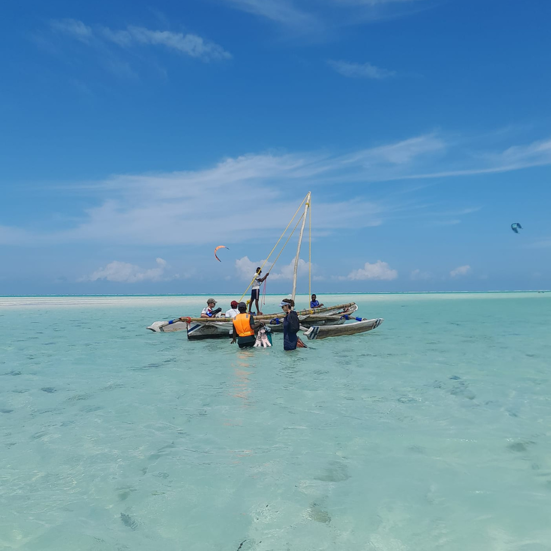 zanzibar crystal clear waters and a boat out on the horizon