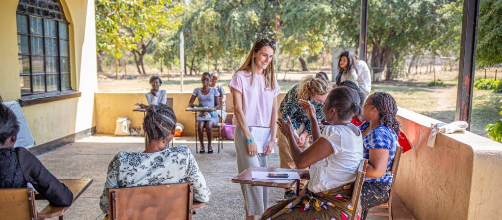 a volunteer talking with the elderly