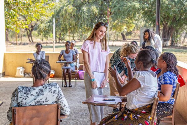 a volunteer talking with the elderly