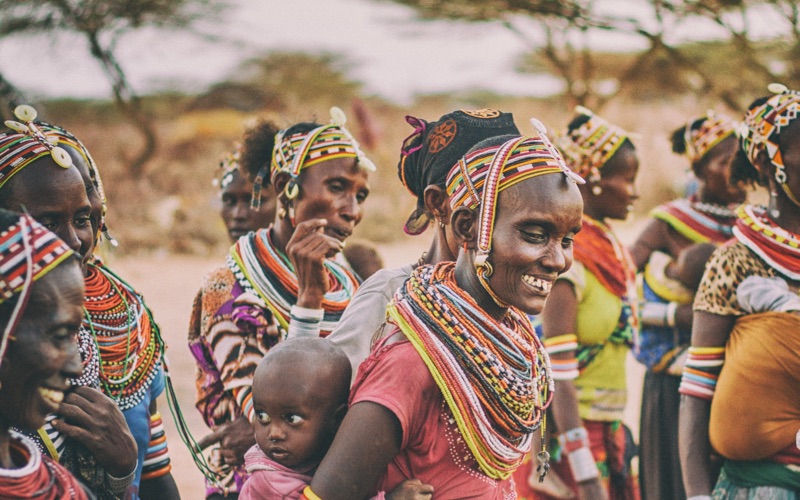 A group of women dressed in vibrant traditional clothing