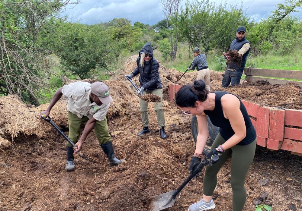 Volunteers fixing flooded road