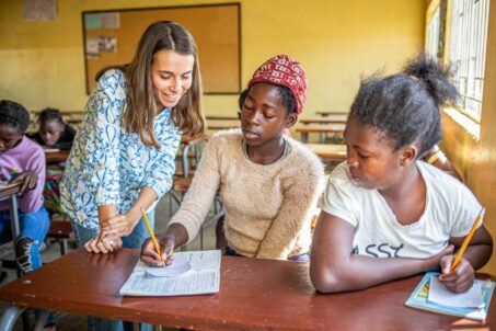 Volunteer Teacher assisting local teachers